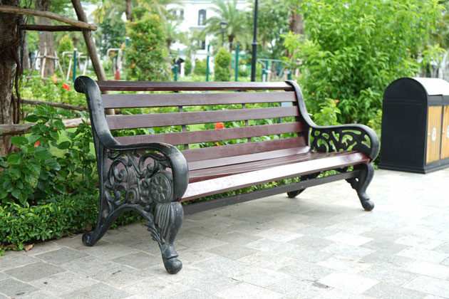 Cast iron bench in garden