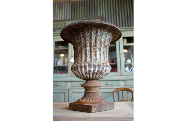 Patina urn planter owns uniqueness